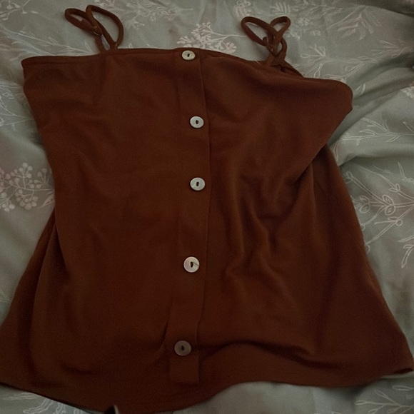 This is a walking on sunshine buttoned brown cropped tank top! Great for spring! - Picture 1 of 2
